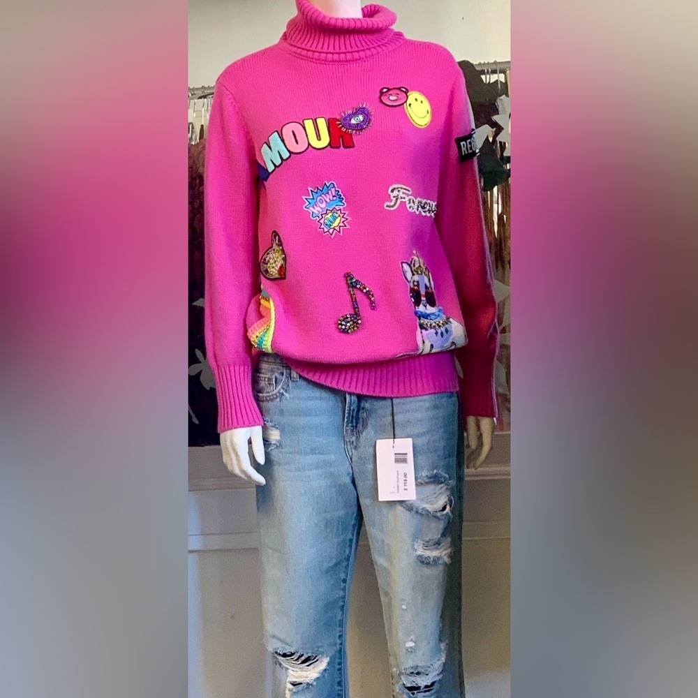 Brand new with tags Regina designed sweater! This piece is gorgeous!